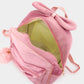 Madeline Love Ivory Bow Pointed Solid Faux Fur Pom Pom Backpack Bag - Bags & Wallets - desc