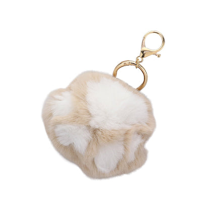 Brown Faux Fur Paw Bag Charm is the perfect accessory for any handbag. Made from high-quality faux fur, this charm adds a touch of luxury and texture to your bag. With a sturdy clasp, it will securely attach to any bag. Bring some personality to your style with this unique charm. 