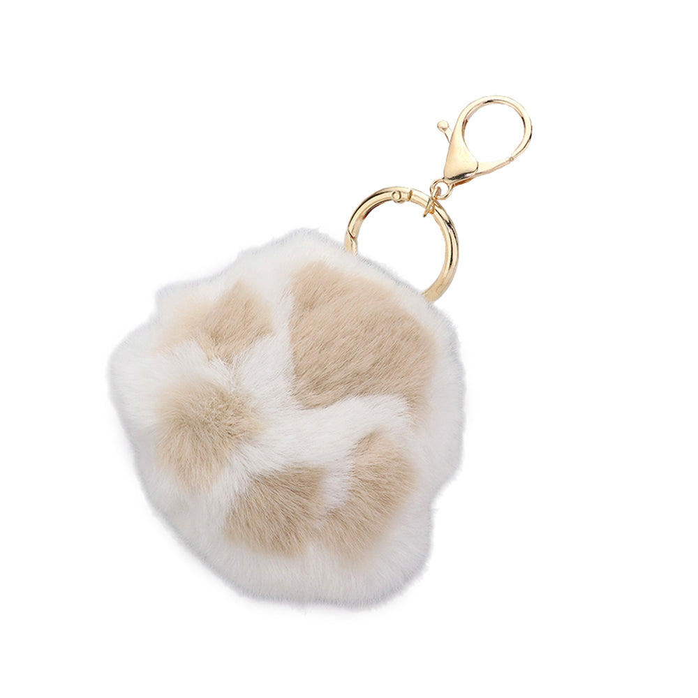 White Faux Fur Paw Bag Charm is the perfect accessory for any handbag. Made from high-quality faux fur, this charm adds a touch of luxury and texture to your bag. With a sturdy clasp, it will securely attach to any bag. Bring some personality to your style with this unique charm. 