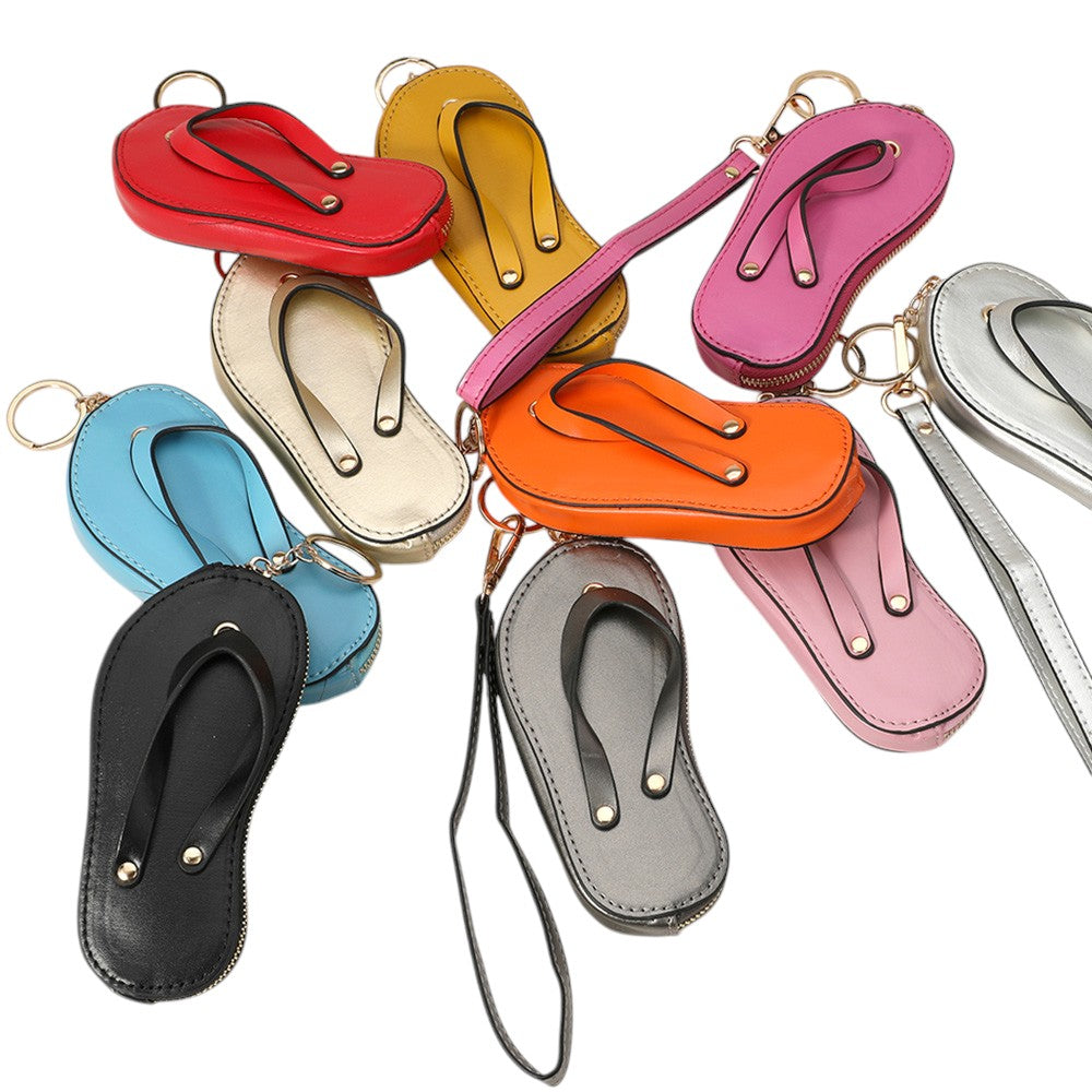 Faux Leather Flip-flop Mini Wristlet Bag Charm Coin Purse offers a convenient and stylish way to carry your essentials. Made from durable faux leather, this mini wristlet bag doubles as a charm for your larger bag. Keep your coins, keys, or credit cards easily accessible with this sleek and functional accessory.