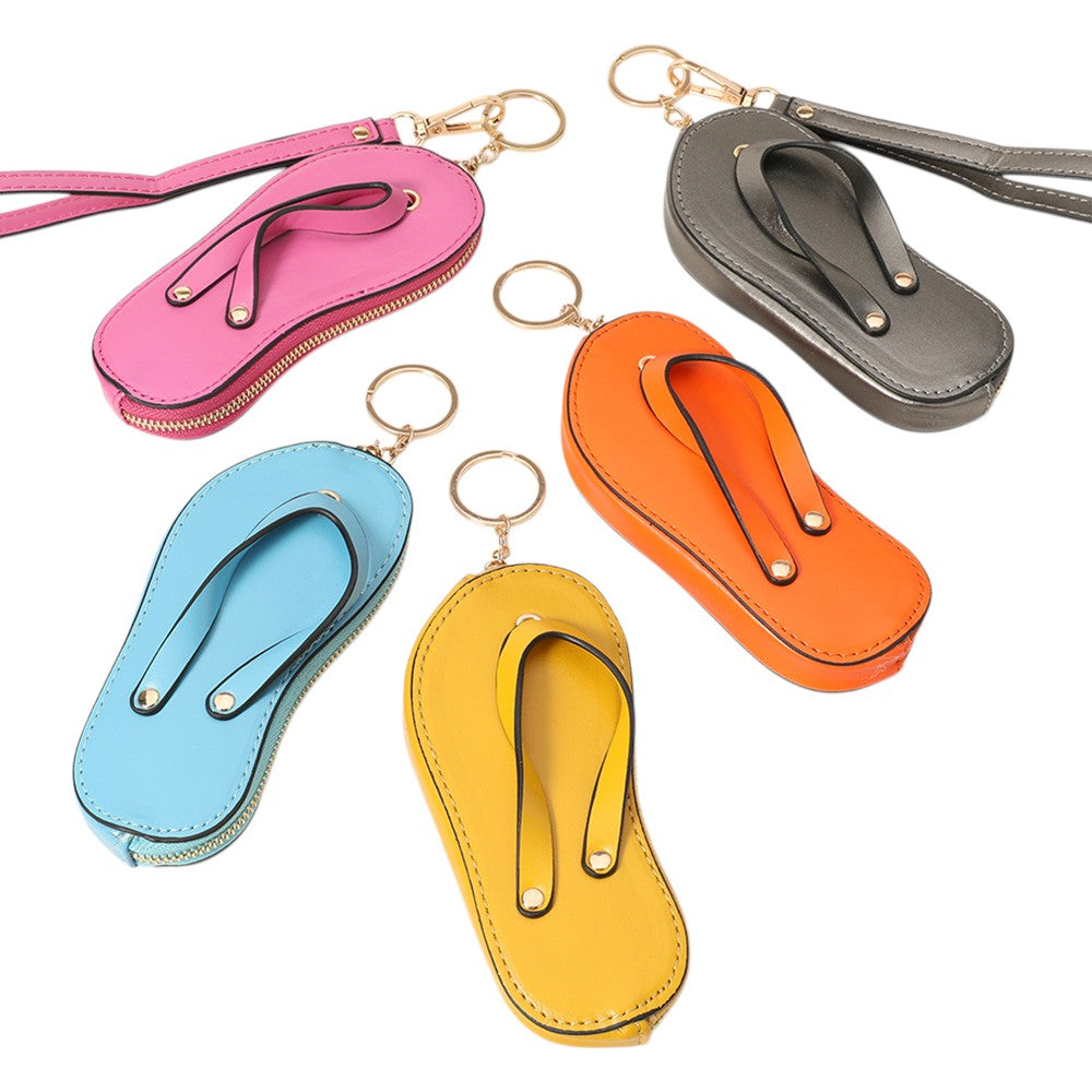 Faux Leather Flip-flop Mini Wristlet Bag Charm Coin Purse offers a convenient and stylish way to carry your essentials. Made from durable faux leather, this mini wristlet bag doubles as a charm for your larger bag. Keep your coins, keys, or credit cards easily accessible with this sleek and functional accessory.