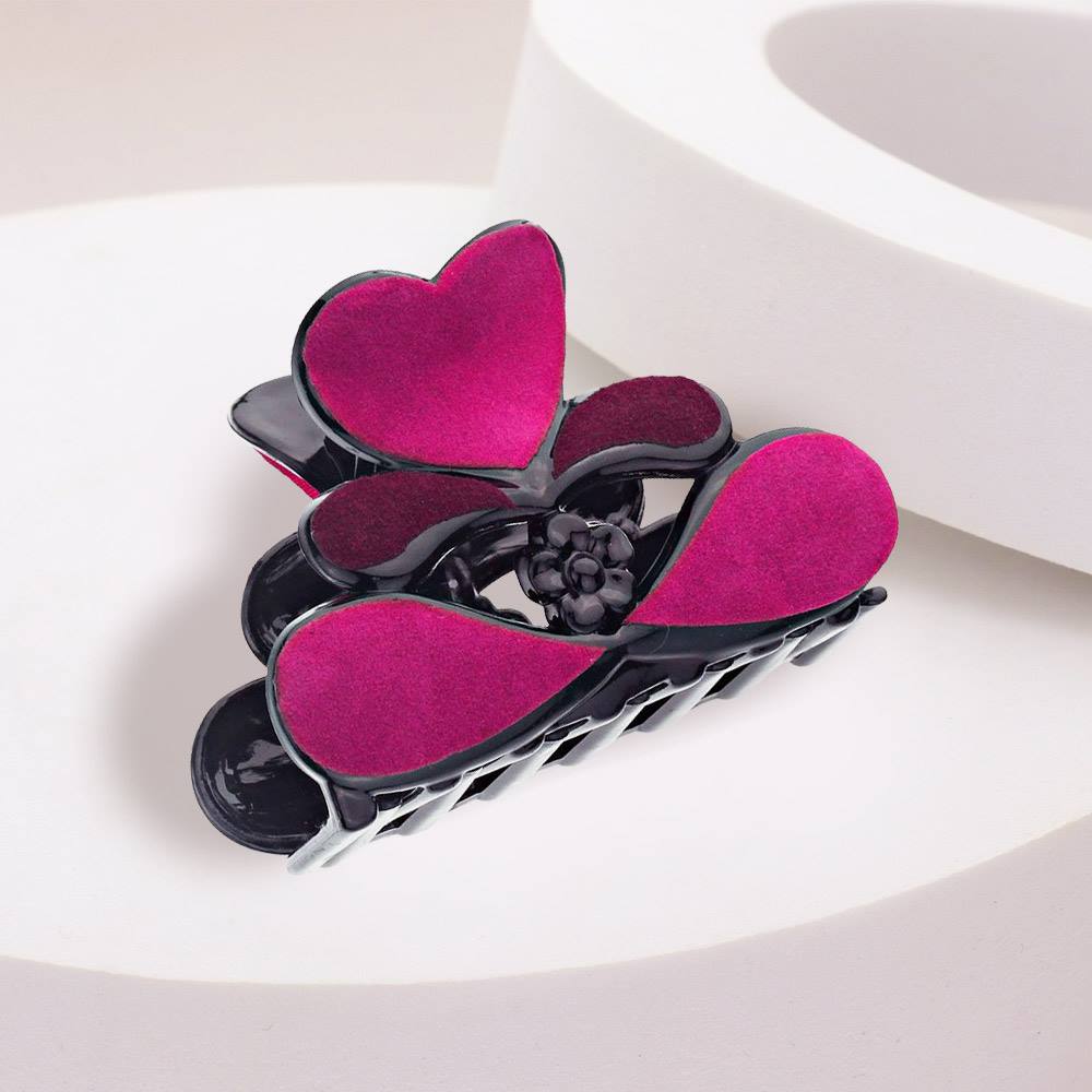 Felt Heart Hair Claw Clip is a must-have accessory for hair enthusiasts. Designed with a sturdy build and soft felt material, it securely holds hair in place while adding a touch of charm. It's ideal for any occasion and a stylish addition to elevate any hairstyle. 