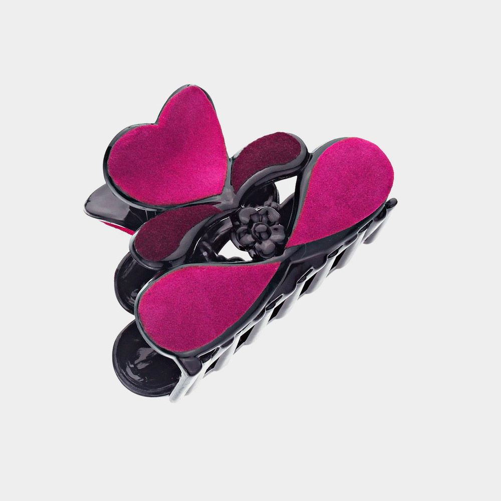 Felt Heart Hair Claw Clip is a must-have accessory for hair enthusiasts. Designed with a sturdy build and soft felt material, it securely holds hair in place while adding a touch of charm. It's ideal for any occasion and a stylish addition to elevate any hairstyle. 