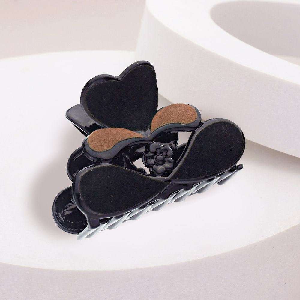 Felt Heart Hair Claw Clip is a must-have accessory for hair enthusiasts. Designed with a sturdy build and soft felt material, it securely holds hair in place while adding a touch of charm. It's ideal for any occasion and a stylish addition to elevate any hairstyle. 