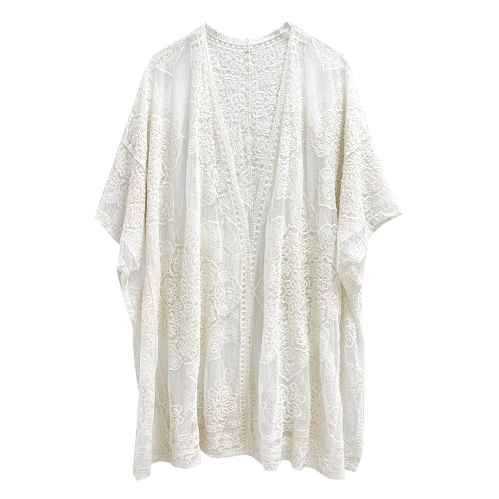 Ivory Flower Lace Kimono Poncho is a versatile and fashionable addition to any wardrobe. The delicate lace detailing adds a touch of elegance, while the kimono style allows for comfortable and easy wear. Perfect for dressing up any outfit, this poncho is a must-have for any fashion-forward individual. 