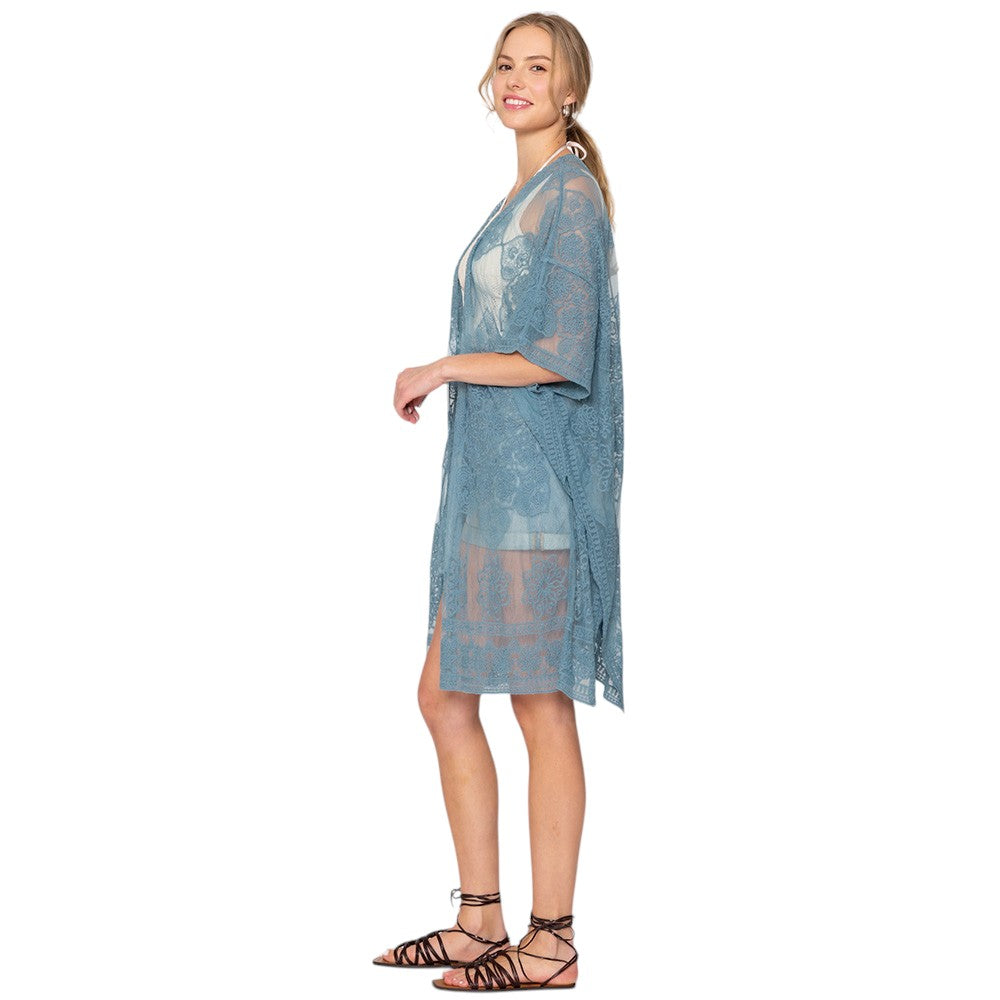 Blue Flower Lace Kimono Poncho is a versatile and fashionable addition to any wardrobe. The delicate lace detailing adds a touch of elegance, while the kimono style allows for comfortable and easy wear. Perfect for dressing up any outfit, this poncho is a must-have for any fashion-forward individual. 