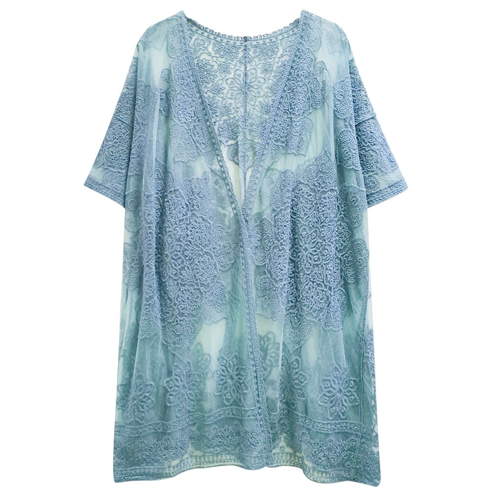Blue Flower Lace Kimono Poncho is a versatile and fashionable addition to any wardrobe. The delicate lace detailing adds a touch of elegance, while the kimono style allows for comfortable and easy wear. Perfect for dressing up any outfit, this poncho is a must-have for any fashion-forward individual. 