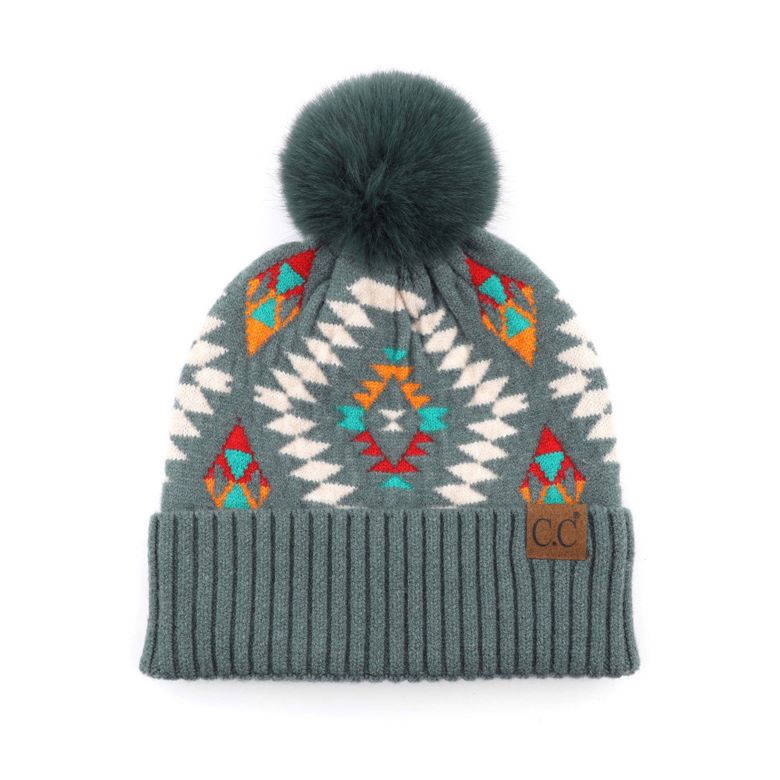Forest Green C.C Soft Aztec Pattern Beanie with Faux Fur Pom,&nbsp;is beautifully knitted with a variety of colors and design that brings a unique look. Coordinate these aztec pattern beannie with any outfit to match the best with absolute warmth and coziness in style. This is an ideal winter head cover that comes in one size winter cap with a faux fur pom that fits most head sizes. Perfect winter gift accessory for your friends, family, and the persons you love.