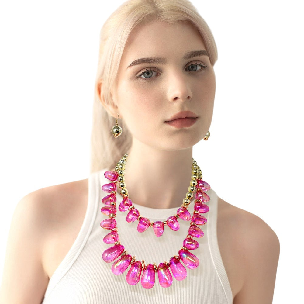 Fuchsia Chunky Beaded Double Layered Statement Necklace adds a bold touch to any outfit. Its chunky and beaded design exudes confidence and its double layered style adds a unique touch. Perfect for elevating any look, this necklace is a must-have for any fashion-forward individual. 