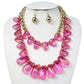 Fuchsia Chunky Beaded Double Layered Statement Necklace adds a bold touch to any outfit. Its chunky and beaded design exudes confidence and its double layered style adds a unique touch. Perfect for elevating any look, this necklace is a must-have for any fashion-forward individual. 