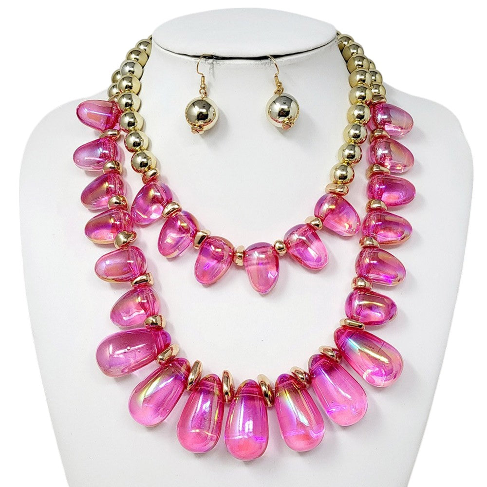 Fuchsia Chunky Beaded Double Layered Statement Necklace adds a bold touch to any outfit. Its chunky and beaded design exudes confidence and its double layered style adds a unique touch. Perfect for elevating any look, this necklace is a must-have for any fashion-forward individual. 