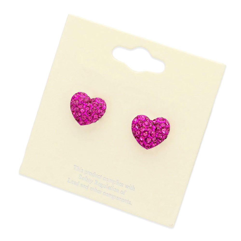 Fuchsia Crystal Pave Heart Stud Earrings add elegance to any outfit. The sparkling pave design is crafted precisely, and the heart shape symbolizes love and affection, making them the perfect accessory for any special occasion.