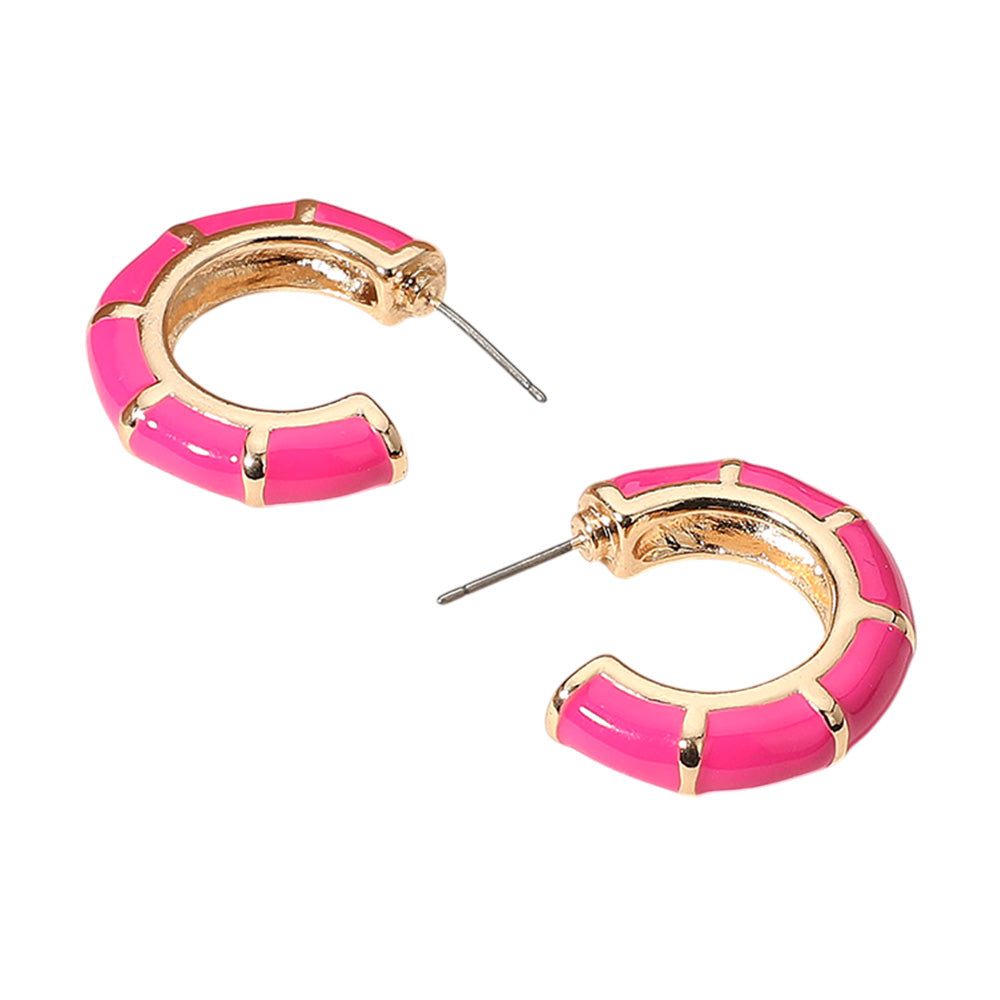 Fuchsia Enamel Bamboo Hoop Earrings are the perfect blend of style and sustainability. Made from bamboo, these earrings are eco-friendly and lightweight, making them comfortable to wear. The enamel finish adds a pop of color and shine, making them a versatile accessory for any outfit. Upgrade your style while also making a positive impact on the environment.