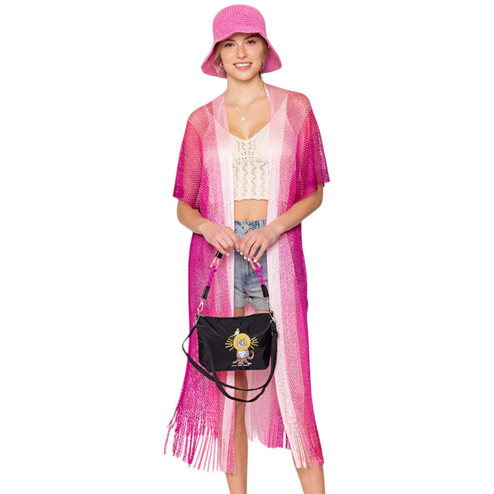 Fuchsia-Two Tone Lurex Kimono Poncho is a versatile and stylish addition to any wardrobe. Made with a unique Lurex fabric, it adds a touch of shimmer to your outfit. Its kimono design offers a comfortable and flattering fit, making it suitable for any body type. Perfect for adding a pop of color and sparkle to your outfit. 