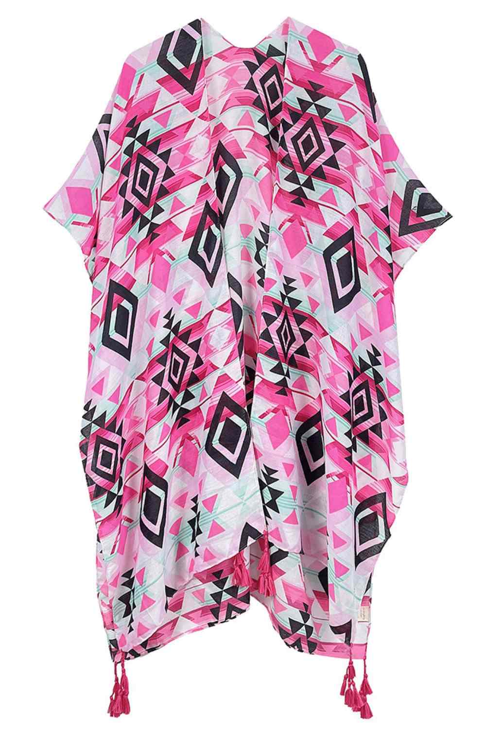 Fuchsia Embrace bohemian elegance with this striking Aztec Pattern Print Tassel Kimono. Crafted from lightweight 100% polyester, this versatile piece features bold geometric patterns inspired by traditional Aztec designs, complete with decorative tassels for added flair. Perfect for layering over dresses, swimwear, or casual outfits, it drapes beautifully with a generous 35.4" length and width. Ideal for beach days, festivals, or relaxed weekend wear. Made in China.