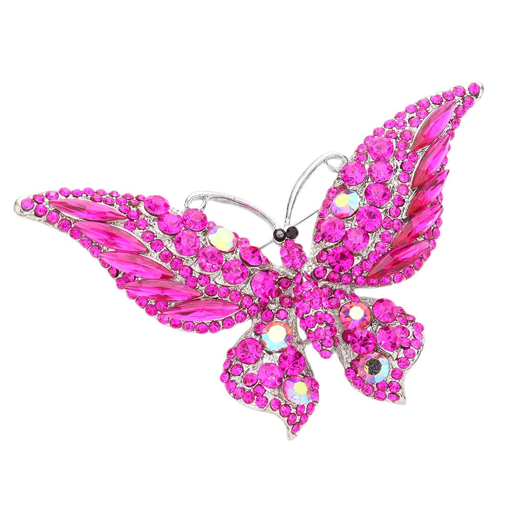 Fuchsia Glass Crystal Butterfly Pin Brooch is expertly crafted with sparkling glass crystals, adding a touch of elegance and sophistication to any outfit. With its timeless butterfly design, this tasteful accessory is perfect for any occasion. Enhance your ensemble with a touch of shimmer and charm.
