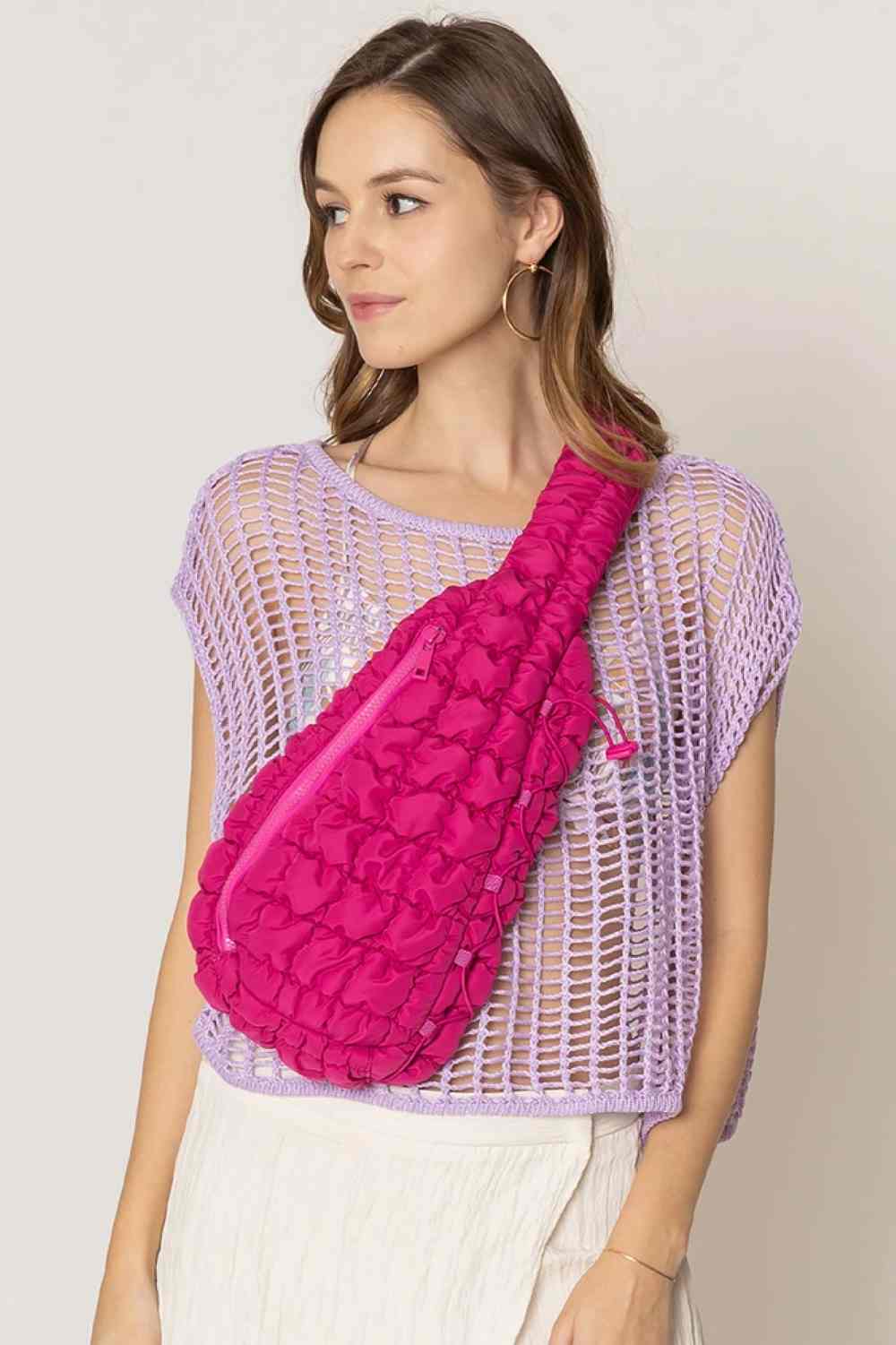 Fuchsia Carry your essentials in style with this Solid Quilted Sling Bag. Crafted from durable 100% polyester with a classic quilted design, it offers a sleek, versatile look that complements any outfit. The adjustable sling strap allows for comfortable crossbody wear, making it perfect for everyday errands, travel, or casual outings. One size fits all