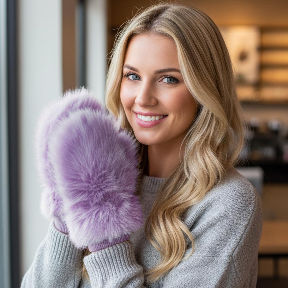Lavender Faux Fur Mitten Gloves, the perfect winter accessory for keeping your hands warm and stylish. Made with high-quality faux fur, these gloves provide exceptional warmth and comfort. With a versatile design that combines the benefits of both mittens and gloves, these Faux Fur Mitten Gloves are essential for any cold weather wardrobe. It is an incomparable gift to the one you love the most. Stay lovely and luxurious!