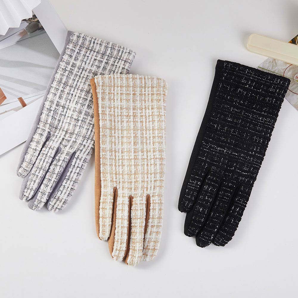 Black Modern winter gloves featuring a refined textured design and touchscreen-friendly fingertips for everyday convenience. Designed to complement seasonal outfits while maintaining practicality, these gloves are ideal for boutique assortments, cold-weather displays, and stylish functional accessory collections.