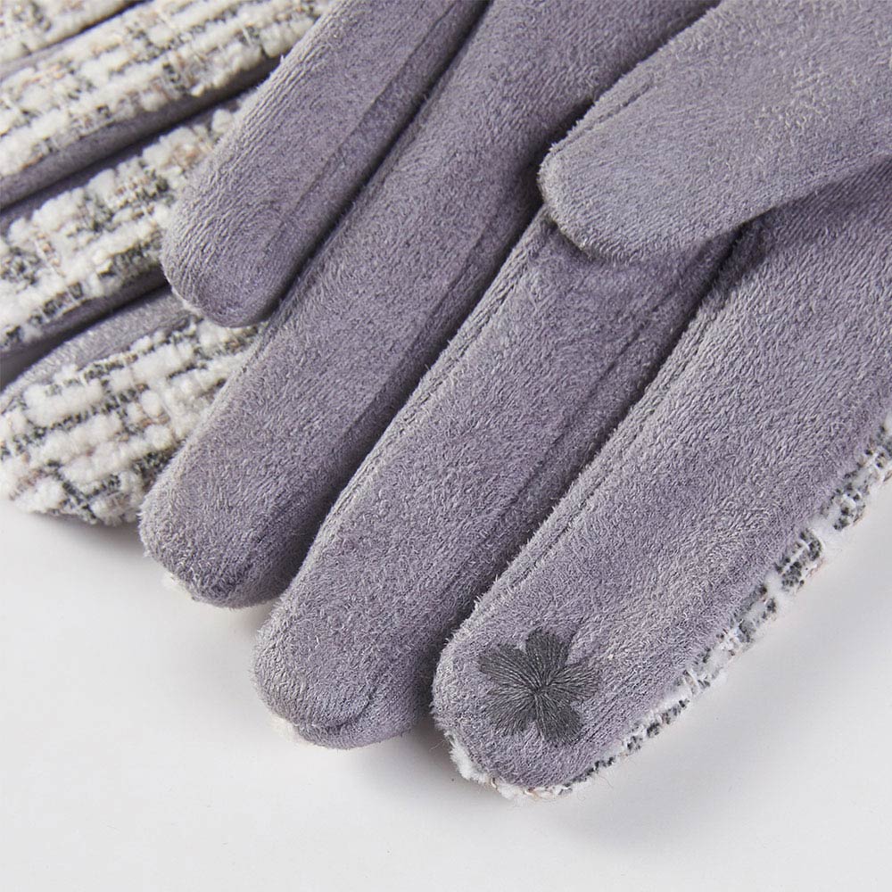 Gray Modern winter gloves featuring a refined textured design and touchscreen-friendly fingertips for everyday convenience. Designed to complement seasonal outfits while maintaining practicality, these gloves are ideal for boutique assortments, cold-weather displays, and stylish functional accessory collections.