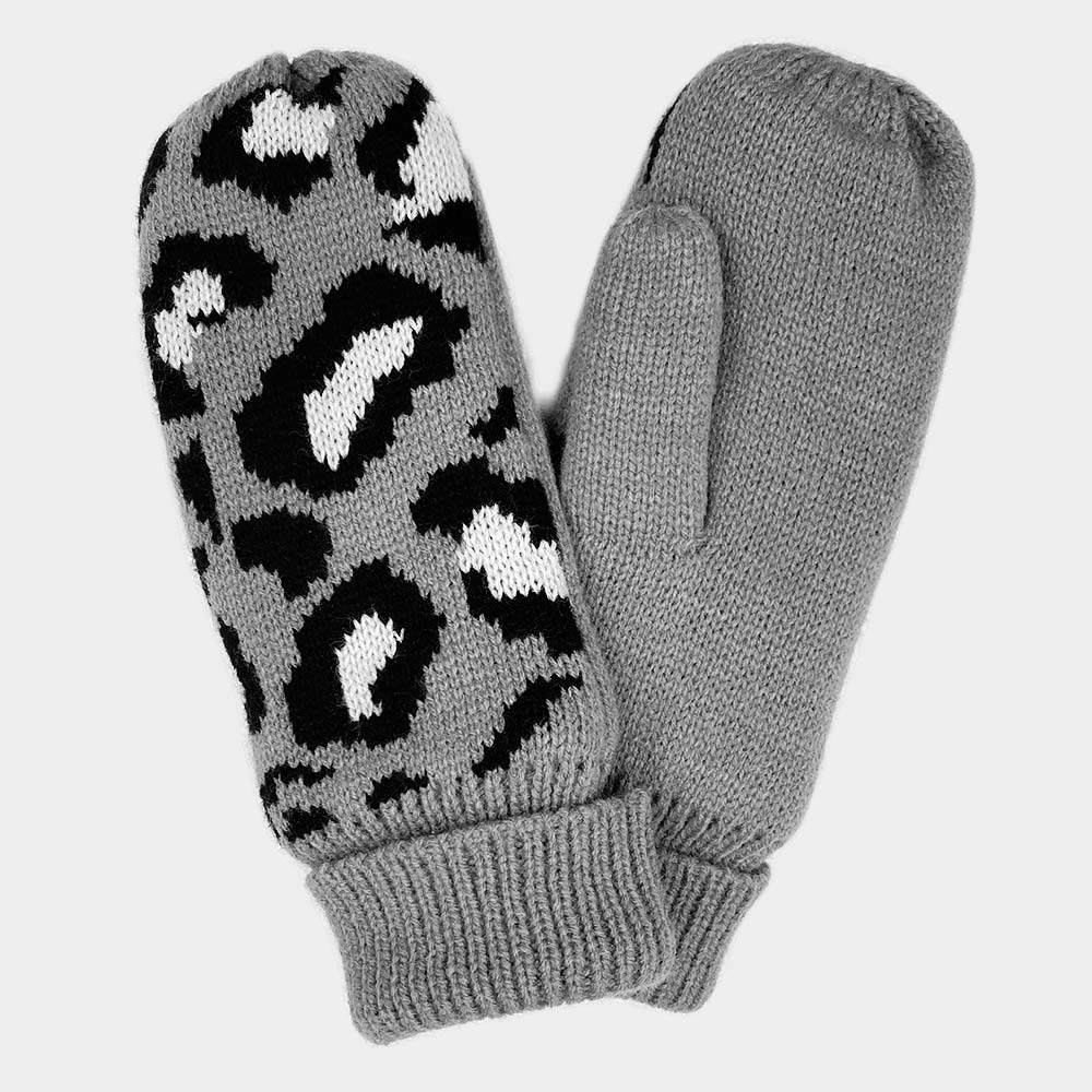 Gray Wrap your hands in wild elegance with our Leopard Patterned Mitten Gloves. The cozy fleece lining keeps you snug while the fierce leopard print adds a touch of untamed charm to your winter outfits. Perfect for adding a pop of personality to your daily ensemble or as a stylish gift for your fashion-forward friend. Stay warm, stay chic!