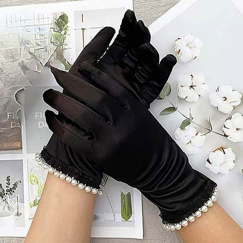 Black Elegant satin-style gloves featuring delicate lace and pearl trim at the cuffs. A refined accessory ideal for formal events, evening wear, or special occasions. Comfortable and stylish for a polished finish.