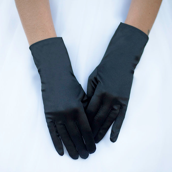 Black Dressy Satin Wedding Gloves are designed to add a touch of sophistication and style to any wedding attire. Made with high-quality satin fabric, they are comfortable to wear and provide a perfect fit. Enhance your wedding look with these chic gloves.