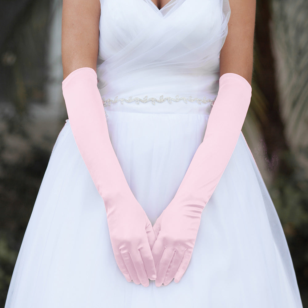 Pink Dressy Satin Wedding chic Gloves are designed to add a touch of sophistication and style to any wedding attire. Made with high-quality satin fabric, they are comfortable to wear and provide a perfect fit. Enhance your wedding look with these chic gloves.