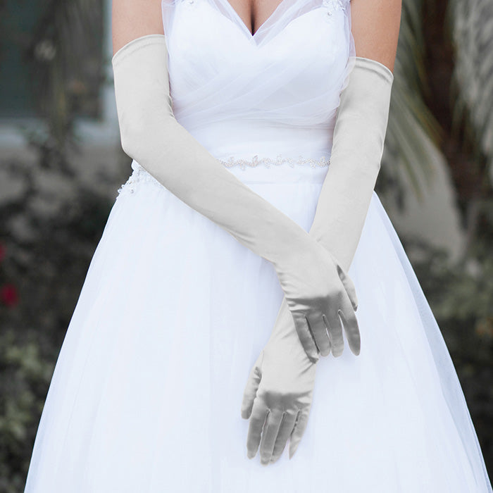 Silver Dressy Satin Long Wedding Gloves feature a smooth, lustrous finish that adds timeless elegance to bridal and formal ensembles. Designed for a comfortable long fit, they provide a polished look while allowing ease of movement throughout your special occasion.