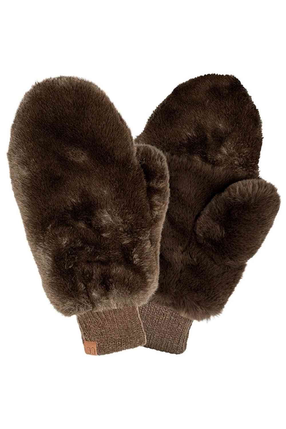 Brown CC Faux Fur Mittens With Shepherd Lining,&nbsp;are a smart, eye-catching, and attractive addition to your outfit. These trendy gloves keep you absolutely warm and toasty in the winter and cold weather outside. Accessorize the fun way with these gloves.&nbsp;It's the autumnal touch you need to finish your outfit in style. A pair of these gloves will be a nice gift for your family, friends, anyone you love, and even yourself.