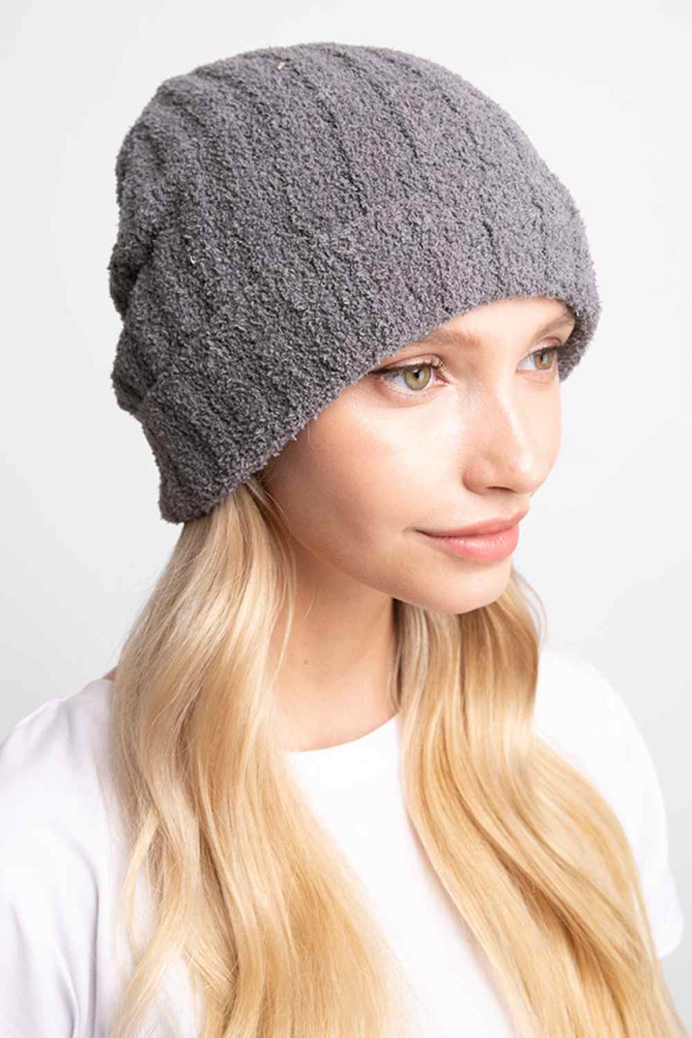 Gray Stay warm and comfortable with this Ribbed Solid Beanie, crafted from 100% poly microfiber for a soft, durable fit. The classic ribbed knit design offers timeless style that pairs effortlessly with any winter outfit.