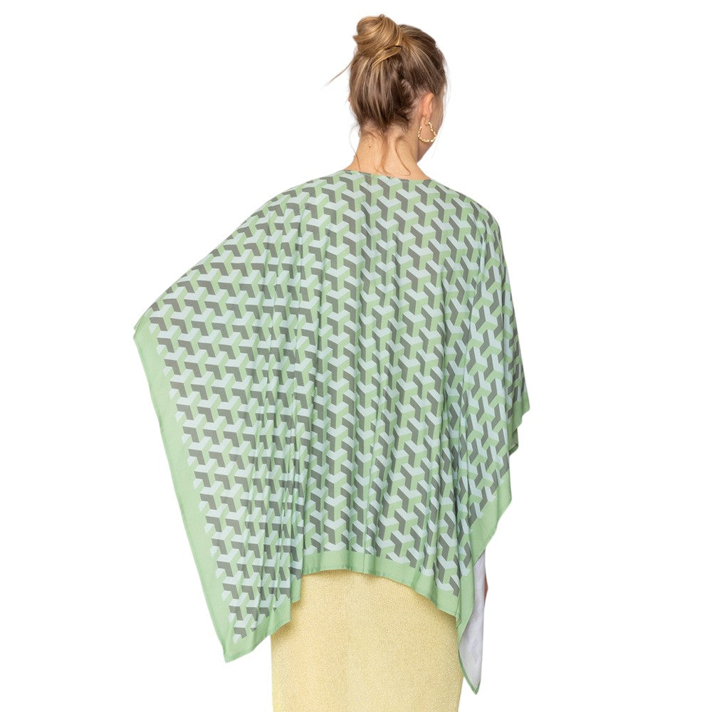 Green Geometric Pattern Print Ruana Poncho is a must-have addition to your wardrobe. Crafted with a unique geometric pattern, this poncho adds a touch of modern style to any outfit. Made with high-quality materials, it provides both comfort and durability. Perfect for any occasion, this versatile piece is a statement piece you won't miss out on. 