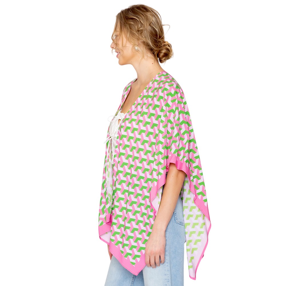 Pink Geometric Pattern Print Ruana Poncho is a must-have addition to your wardrobe. Crafted with a unique geometric pattern, this poncho adds a touch of modern style to any outfit. Made with high-quality materials, it provides both comfort and durability. Perfect for any occasion, this versatile piece is a statement piece you won't miss out on. 