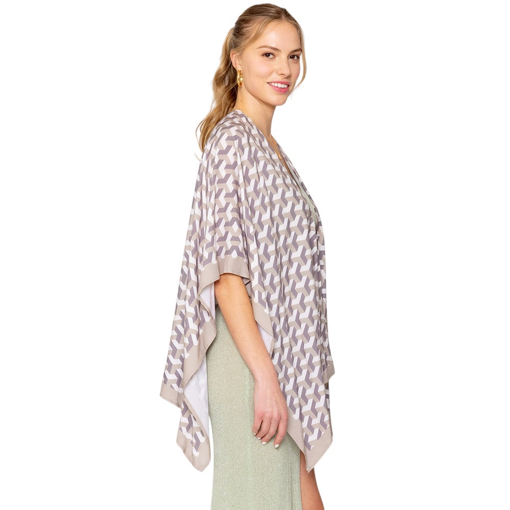 Beige Geometric Pattern Print Ruana Poncho is a must-have addition to your wardrobe. Crafted with a unique geometric pattern, this poncho adds a touch of modern style to any outfit. Made with high-quality materials, it provides both comfort and durability. Perfect for any occasion, this versatile piece is a statement piece you won't miss out on. 