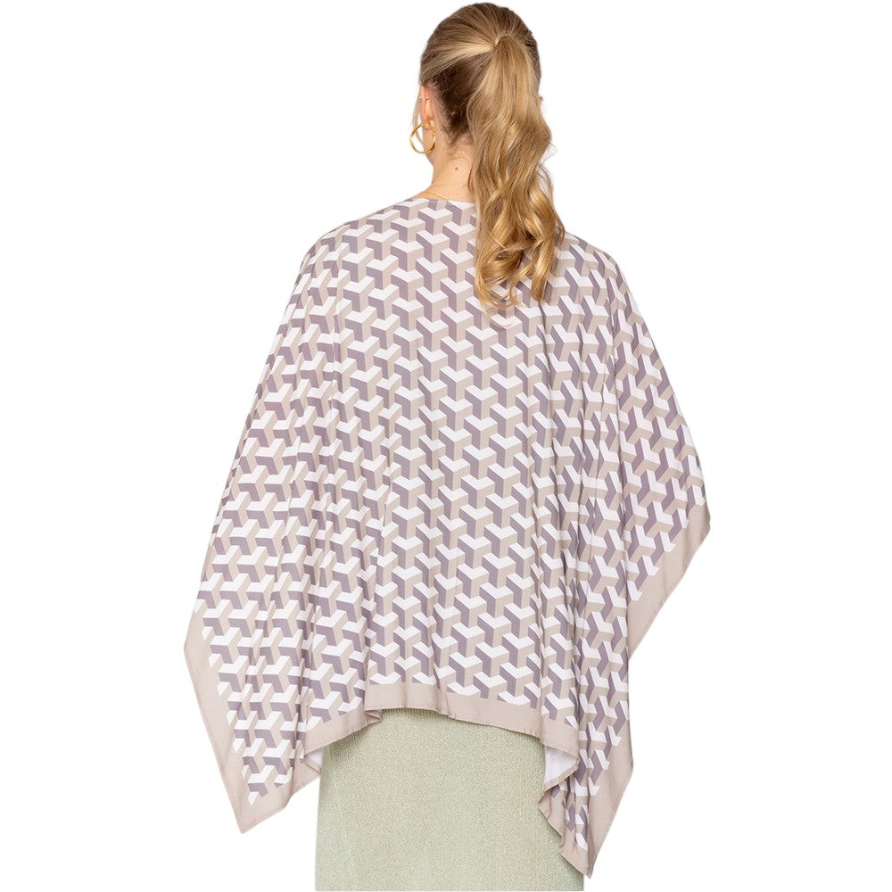 Beige Geometric Pattern Print Ruana Poncho is a must-have addition to your wardrobe. Crafted with a unique geometric pattern, this poncho adds a touch of modern style to any outfit. Made with high-quality materials, it provides both comfort and durability. Perfect for any occasion, this versatile piece is a statement piece you won't miss out on. 