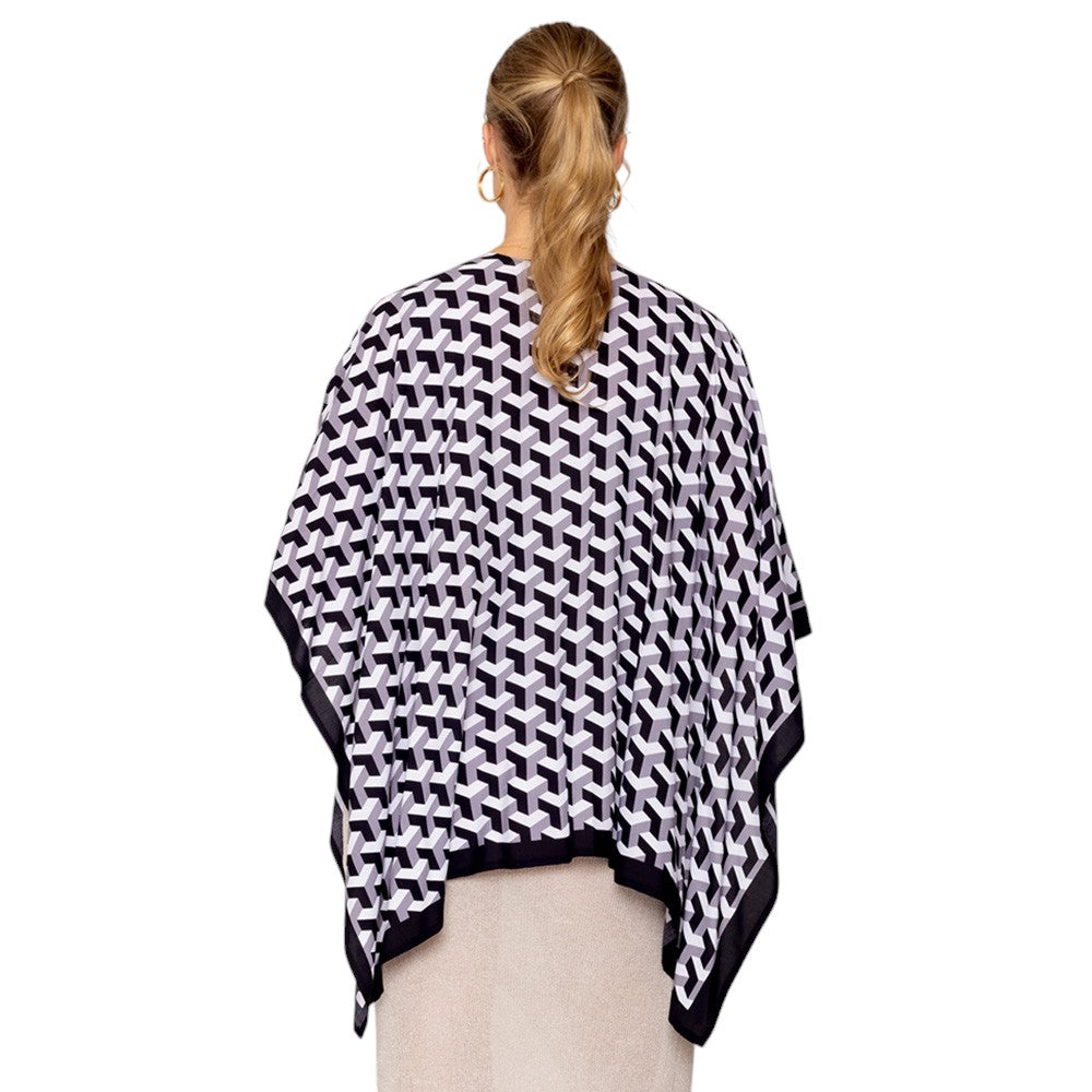 Black Geometric Pattern Print Ruana Poncho is a must-have addition to your wardrobe. Crafted with a unique geometric pattern, this poncho adds a touch of modern style to any outfit. Made with high-quality materials, it provides both comfort and durability. Perfect for any occasion, this versatile piece is a statement piece you won't miss out on. 