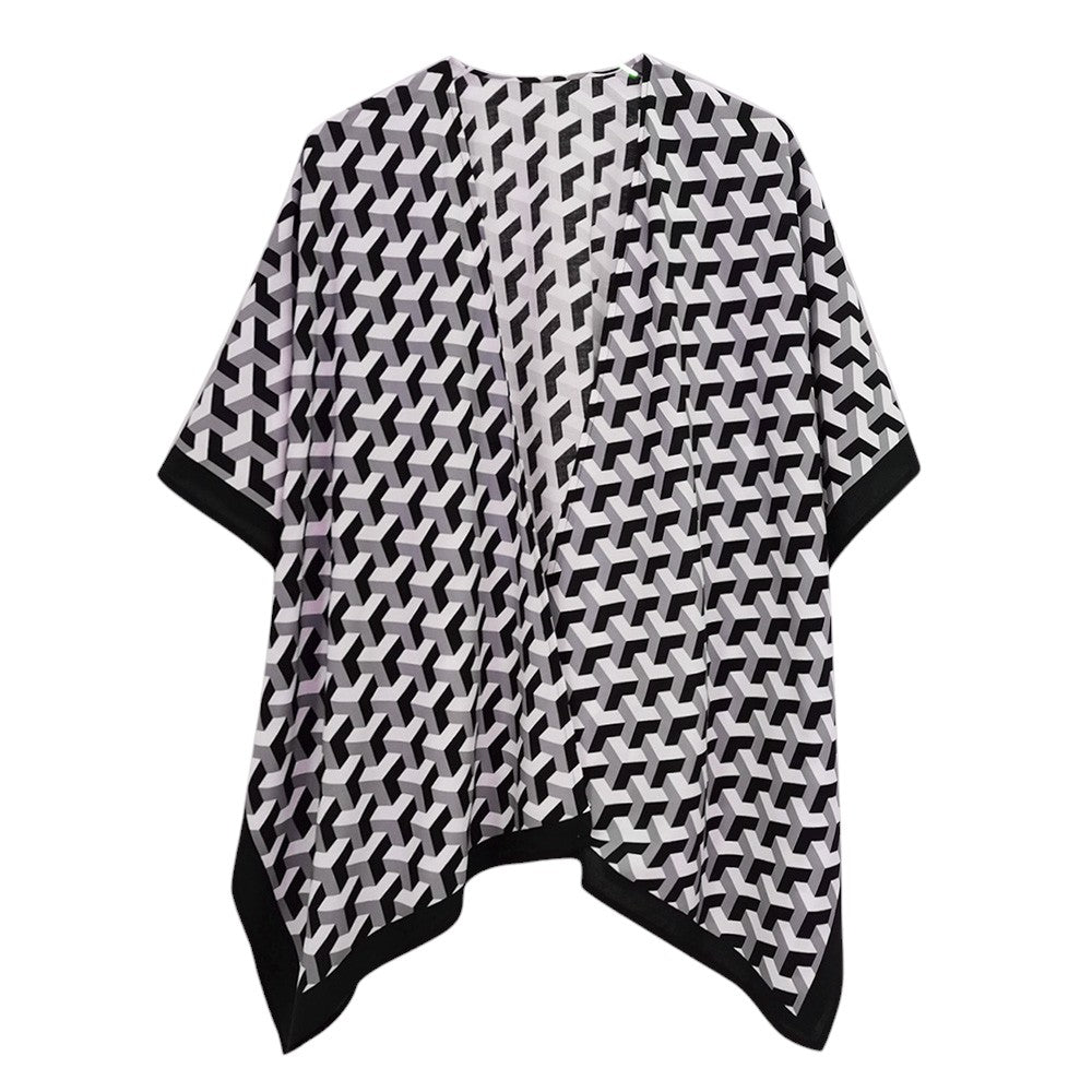 Black Geometric Pattern Print Ruana Poncho is a must-have addition to your wardrobe. Crafted with a unique geometric pattern, this poncho adds a touch of modern style to any outfit. Made with high-quality materials, it provides both comfort and durability. Perfect for any occasion, this versatile piece is a statement piece you won't miss out on. 