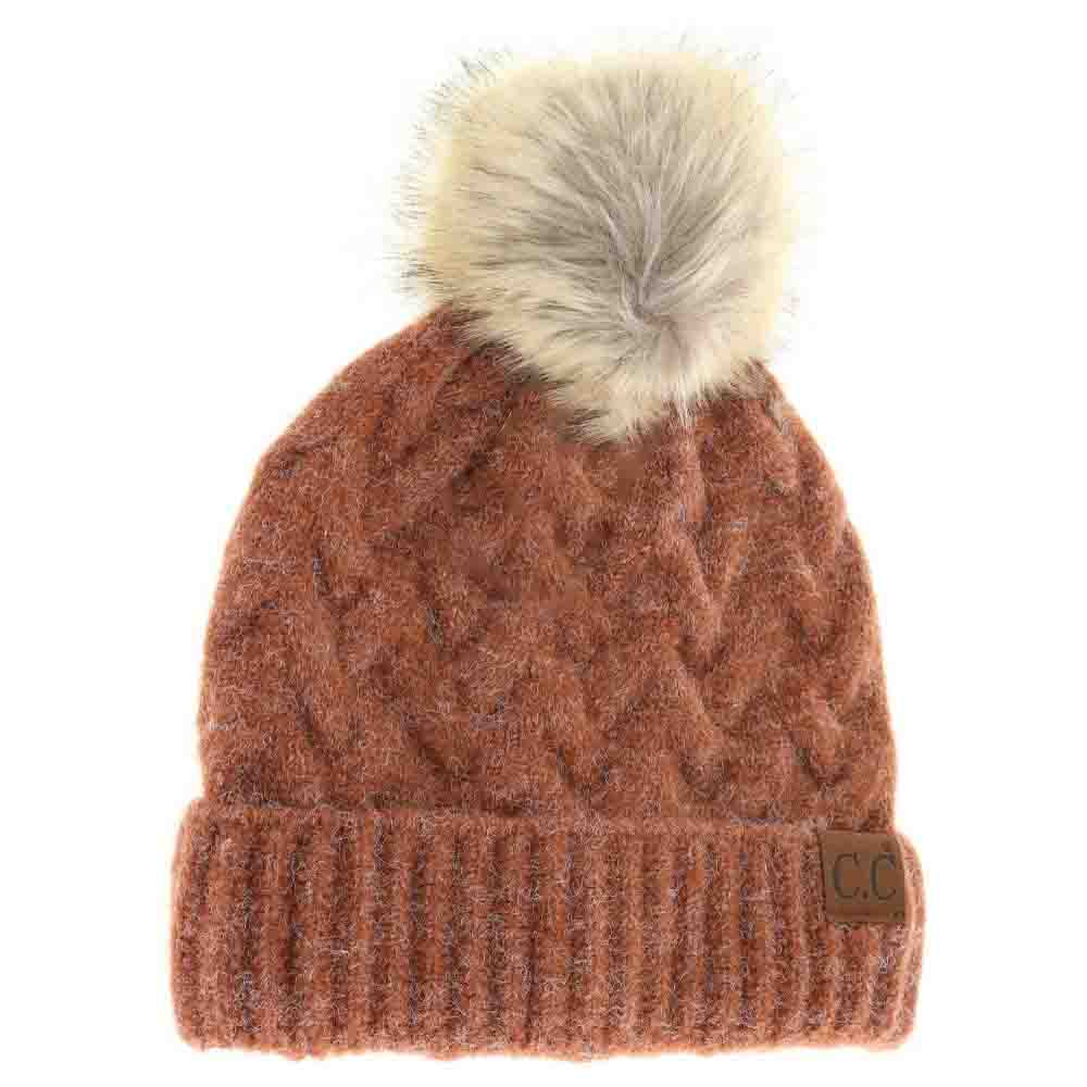 Ginger Brown Chunky Braided Cable Knit Fur Pom C.C Beanie combines classic craftsmanship with modern warmth. Expertly knit with thick braided cables, this beanie provides robust insulation against cold weather. The plush fur pom adds a refined, textured accent, enhancing both style and comfort. Designed for a snug yet flexible fit, it offers reliable protection for winter activities while elevating your everyday cold-weather wardrobe. 