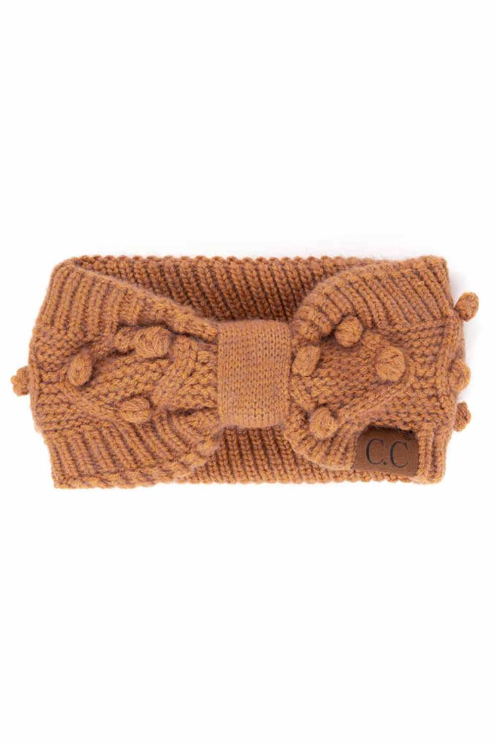 Ginger Brown Cozy up with the C.C Bobble Headwrap, the perfect accessory for chilly days and casual style. Crafted from 100% acrylic, this soft and stretchy headwrap features handmade bobbles that add playful texture and charm. One size fits most, making it an easy grab-and-go essential. Whether you're running errands or bundling up outdoors, this versatile wrap keeps you warm while adding a touch of personality to any outfit. Made in China with quality craftsmanship you can trust.