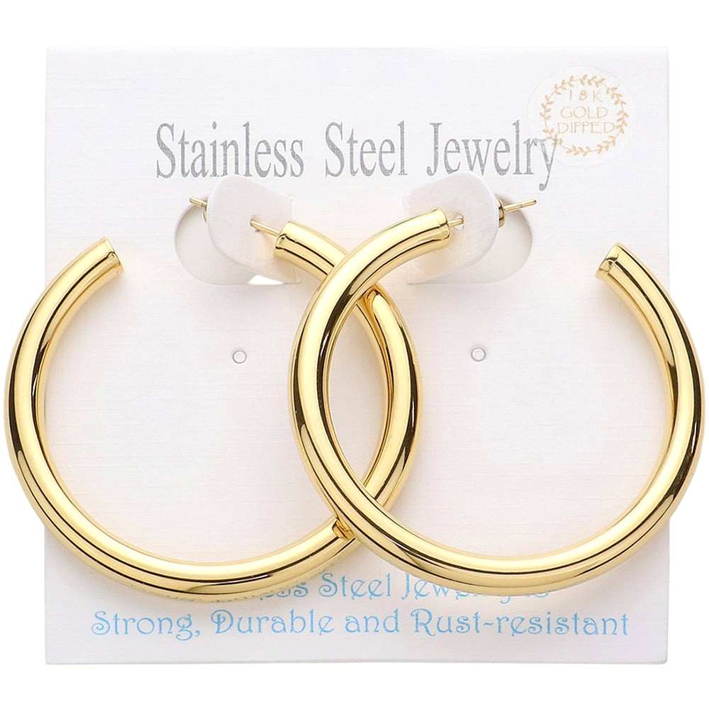 Gold 18K Gold Dipped Stainless Steel Hoop Earrings add a touch of elegance and durability to your everyday look. Made of high-quality stainless steel with gold plating, these earrings are both stylish and long-lasting. Elevate your style and make a lasting impression with these timeless hoop earrings.