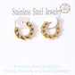Gold 18K gold dipped stainless steel mini hoop earrings feature a unique twisted design, adding a touch of elegance to any outfit. The durable stainless steel material ensures long-lasting wear. Upgrade your jewellery collection with these stylish hoops.