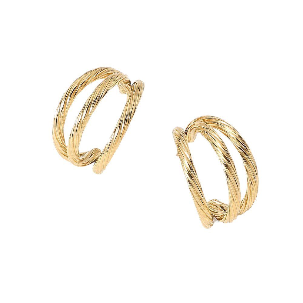 Gold 18K gold dipped stainless steel textured split hoop earrings offer a stylish and versatile addition to any outfit. With the durability and affordability of stainless steel, combined with the elegance of gold, these hoops are the perfect choice for everyday wear. The unique textured design adds a touch of sophistication to any look.