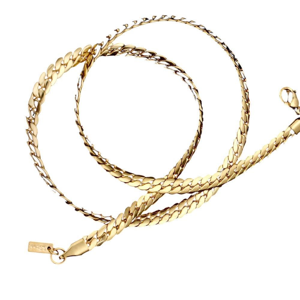 Gold 18 INCH, 5mm Stainless Steel Metal Chain Necklace is a versatile and durable addition to any jewelry collection. At 5mm in width, it provides a timeless and elegant look for everyday wear. Crafted from high-quality stainless steel, it is resistant to tarnishing and perfect for those with sensitive skin. Upgrade your style with this classic piece.