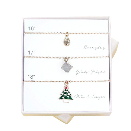 Gold 3PCS Natural Stone Teardrop Christmas Tree Pendant Necklaces. These festive necklaces feature a stylish teardrop shape and a unique holiday-inspired design. Add a festive touch to any outfit with this beautiful set of 3PCS necklaces. Exquisite gift choice for family members, friends, or any close person. 