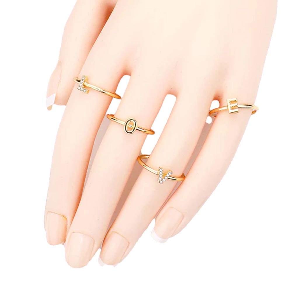 4PCS - LOVE Rhinestone Embellished Message Rings features the word "LOVE" in a sleek, polished design. Each ring is crafted to deliver a subtle sparkle, making them ideal for layering or wearing alone to add a sophisticated statement to any outfit. Perfect for expressing sentiment through elegant accessories, these rings blend durable craftsmanship with refined aesthetics, suitable for everyday wear or special occasions. 