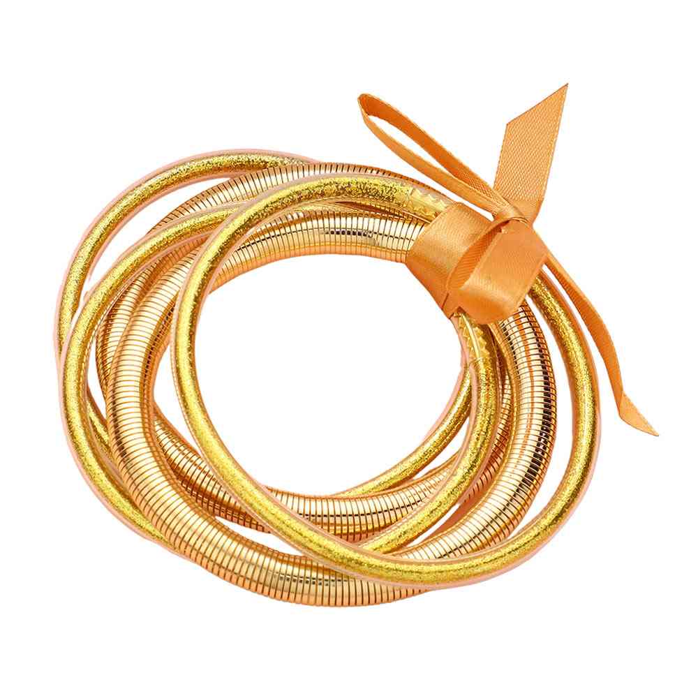 Gold 5PCS Glitter Jelly Tube Metal Elastic Layered Bracelets made with high-quality materials. The elastic design ensures a comfortable fit for all wrist sizes. 