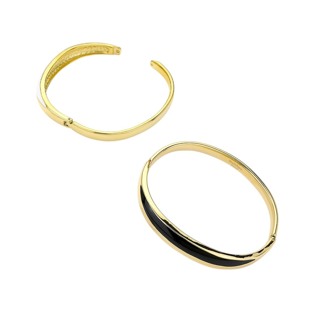 Gold Black White Stainless steel enamel hinged bangle bracelet is a sleek and durable addition to any jewelry collection. Made from high-quality stainless steel, it offers long-lasting wear and a touch of elegance to any outfit. The hinged design allows for easy wear and removal, making it a convenient and stylish choice for daily wear.
