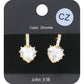 Gold CZ Heart Evening Huggie Earrings. Made with stunning CZ stones, these elegant earrings are perfect for any evening occasion. The huggie design ensures a secure and comfortable fit, while the heart shape adds a touch of romance. Upgrade your jewelry collection with these must-have earrings.