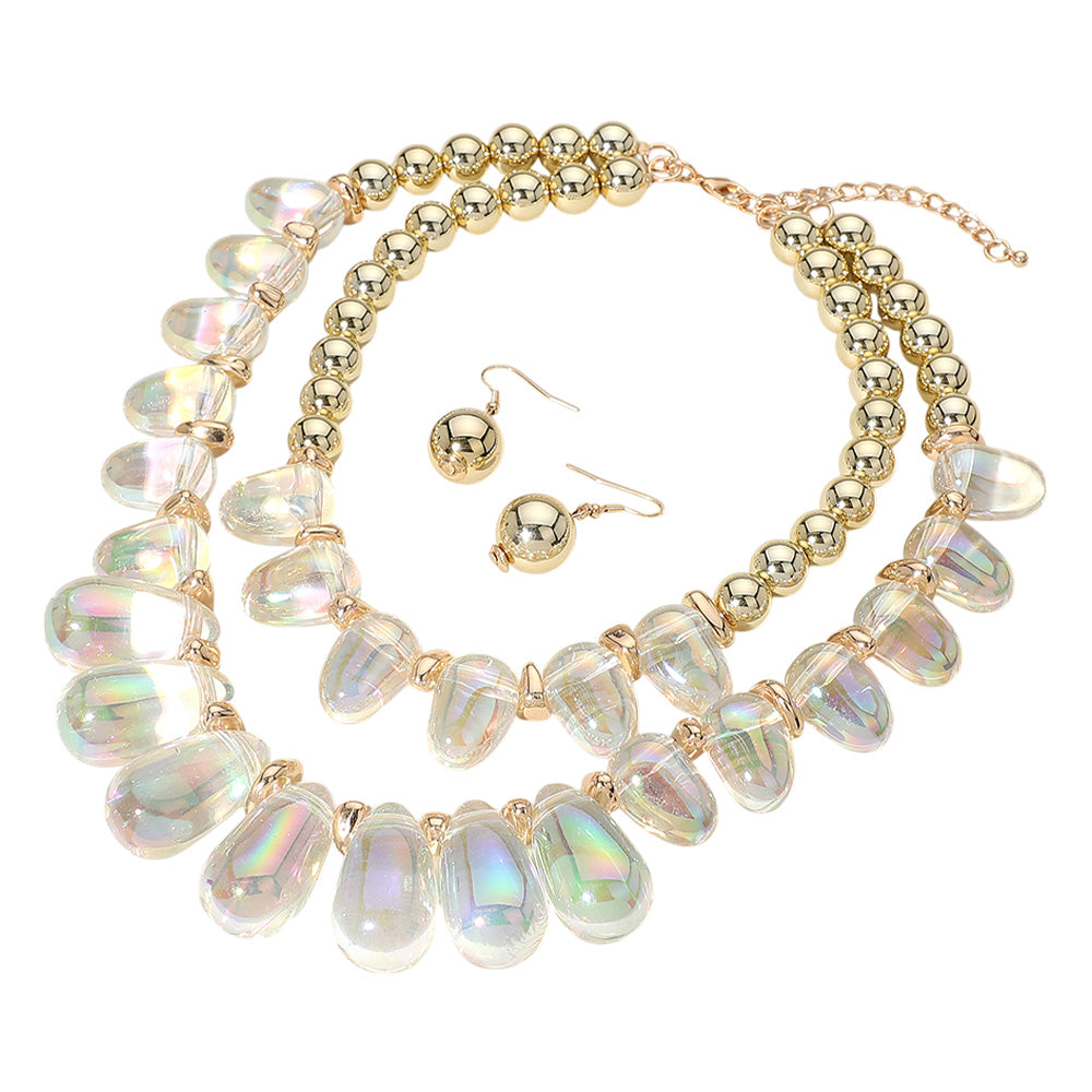 Gold Chunky Beaded Double Layered Statement Necklace adds a bold touch to any outfit. Its chunky and beaded design exudes confidence and its double layered style adds a unique touch. Perfect for elevating any look, this necklace is a must-have for any fashion-forward individual. 