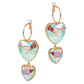 Gold Crystal Stone Double Heart Link Dropdown Earrings are expertly crafted with intricate details that will add a touch of sophistication to any outfit. The sparkling crystal stones and unique heart link design make these earrings a perfect addition to any jewelry collection. Elevate your style with these stunning earrings.